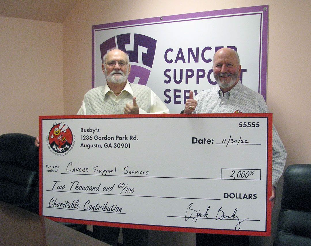 Rick Busby with Cancer Support Services Board President, Hap Harris
