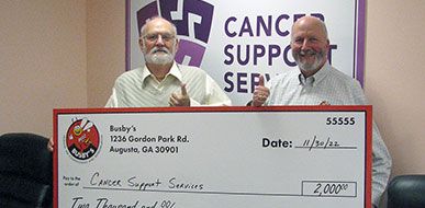 Rick Busby and Cancer Support Services Board President, Hap Harris