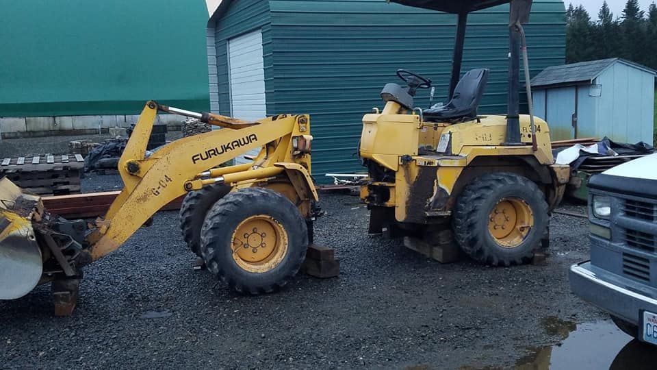 Repairing yellow tractor | Tenino, WA | M & L Equipment