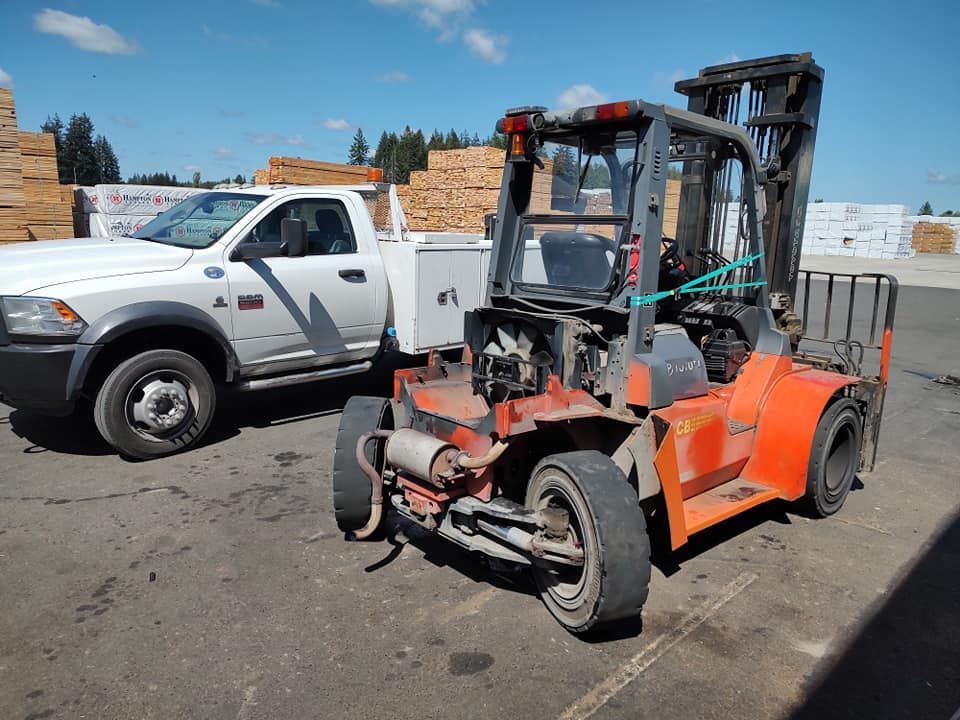 White truck beside the forklift | Tenino, WA | M & L Equipment