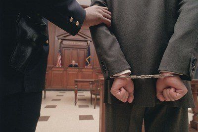 Businessman in handcuffs - Criminal law in Glen Burnie, MD