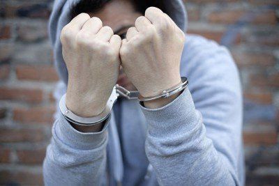Portrait of handcuffed man - Juvenile in Glen Burnie, MD