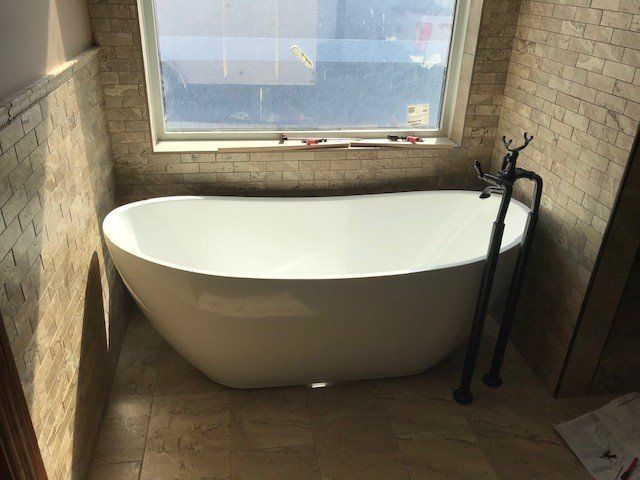 Faucet and white basin — Rock Springs, WY — Plumbing Solutions LLC