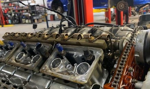 Engine Block Being Serviced Inside Professional Auto Repair Shop | Lake Erie Automotive Service