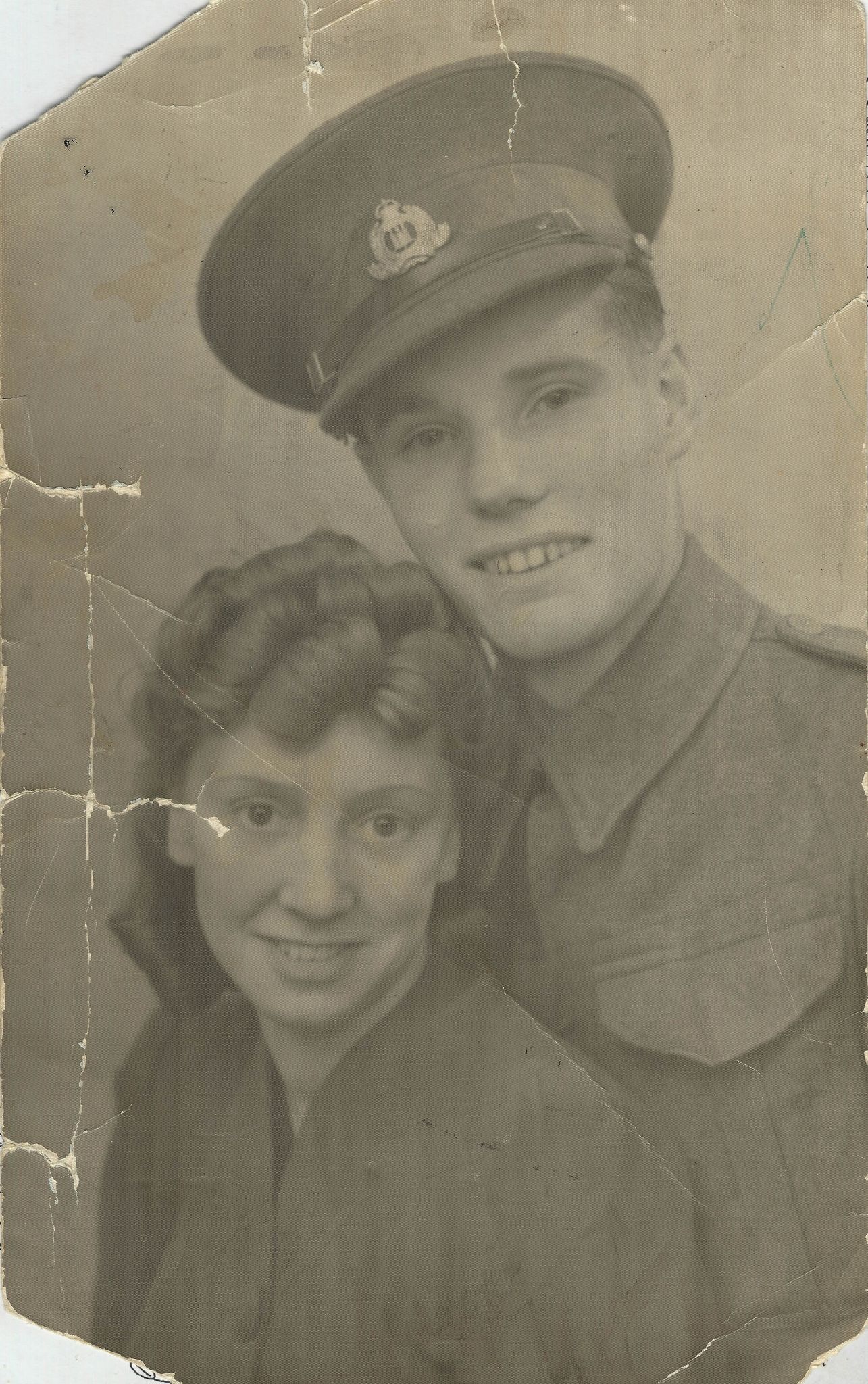 Damaged photo of wartime couple