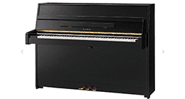 pianoforte nero verticale con tre pedali