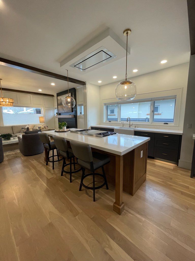 There is a large island in the middle of the kitchen.