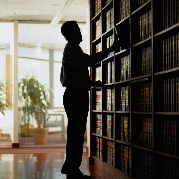 Silhouette of Lawyer in a Law Library — Lawyer in Clarksburg, WV
