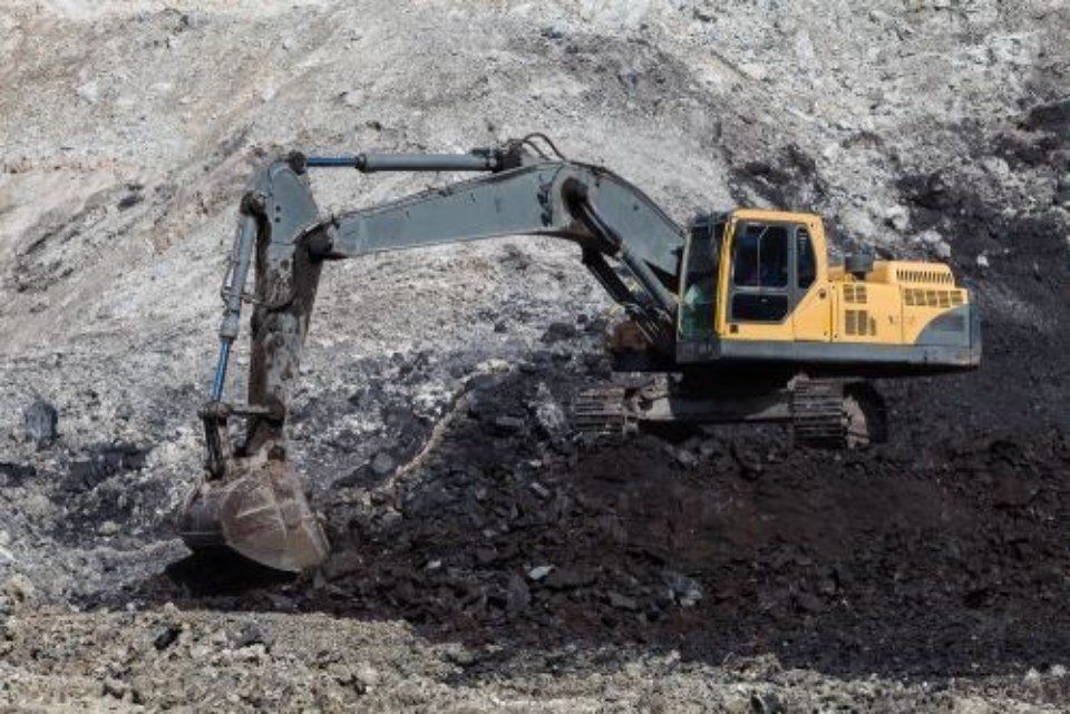 escavatrice con braccio