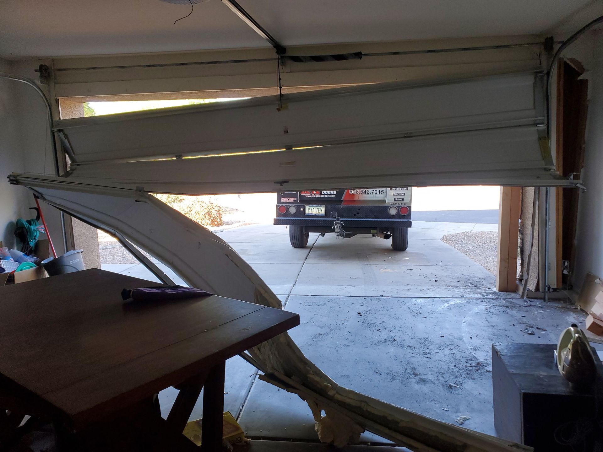 Crashed-garage-door-need-to-be-replaced