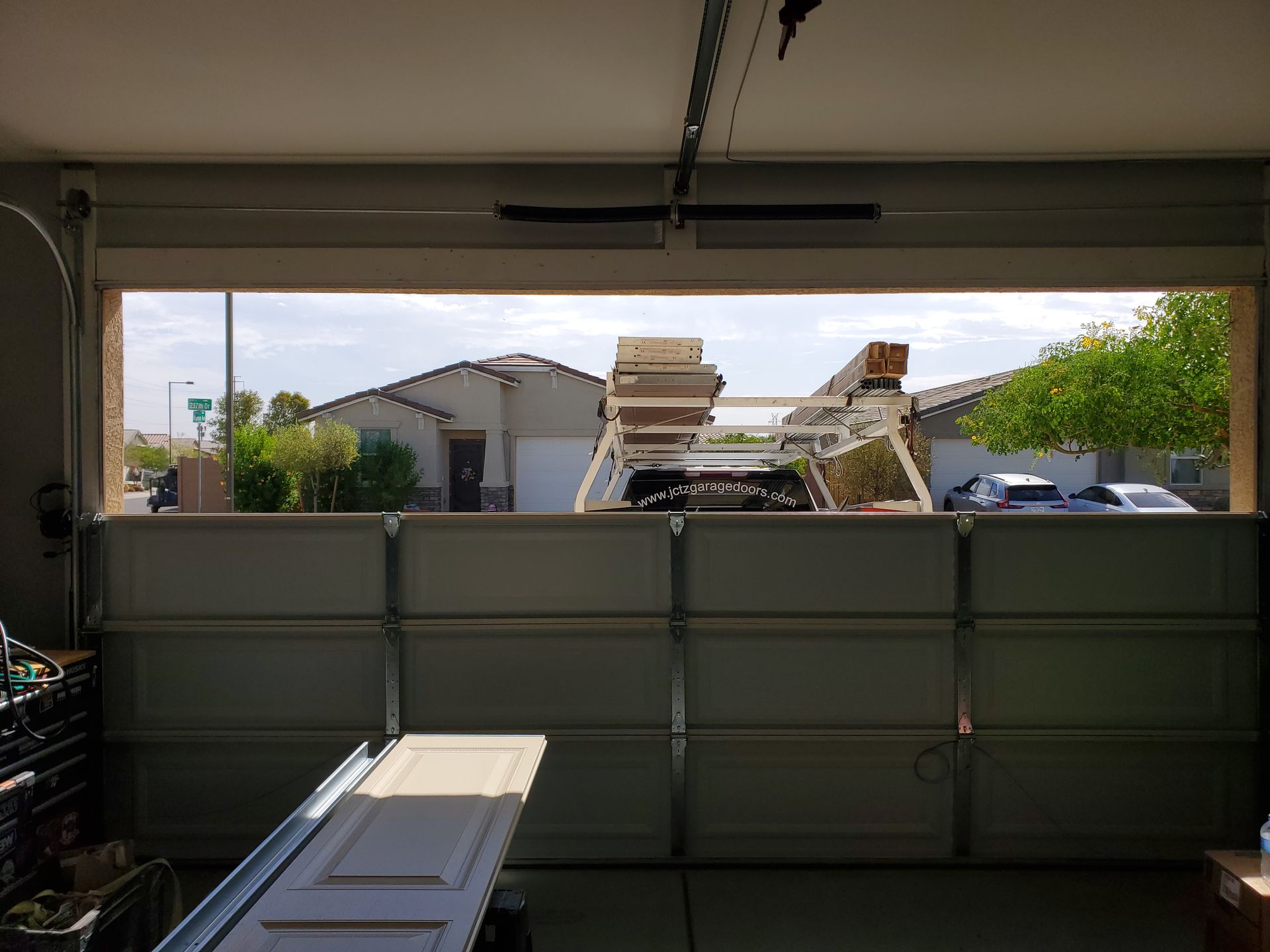 garage door and spring replacement in progress