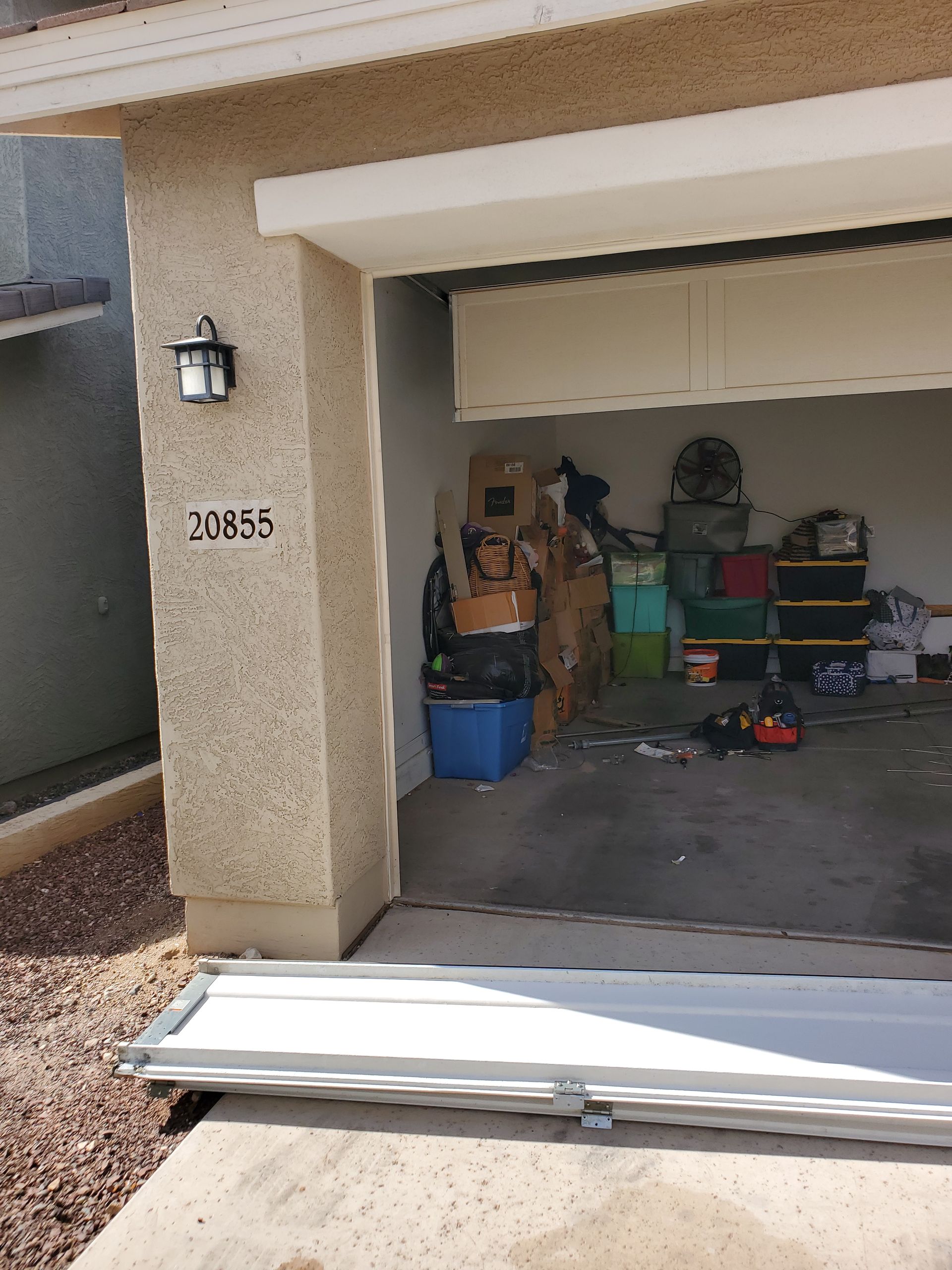 garage door off track needing maintenance