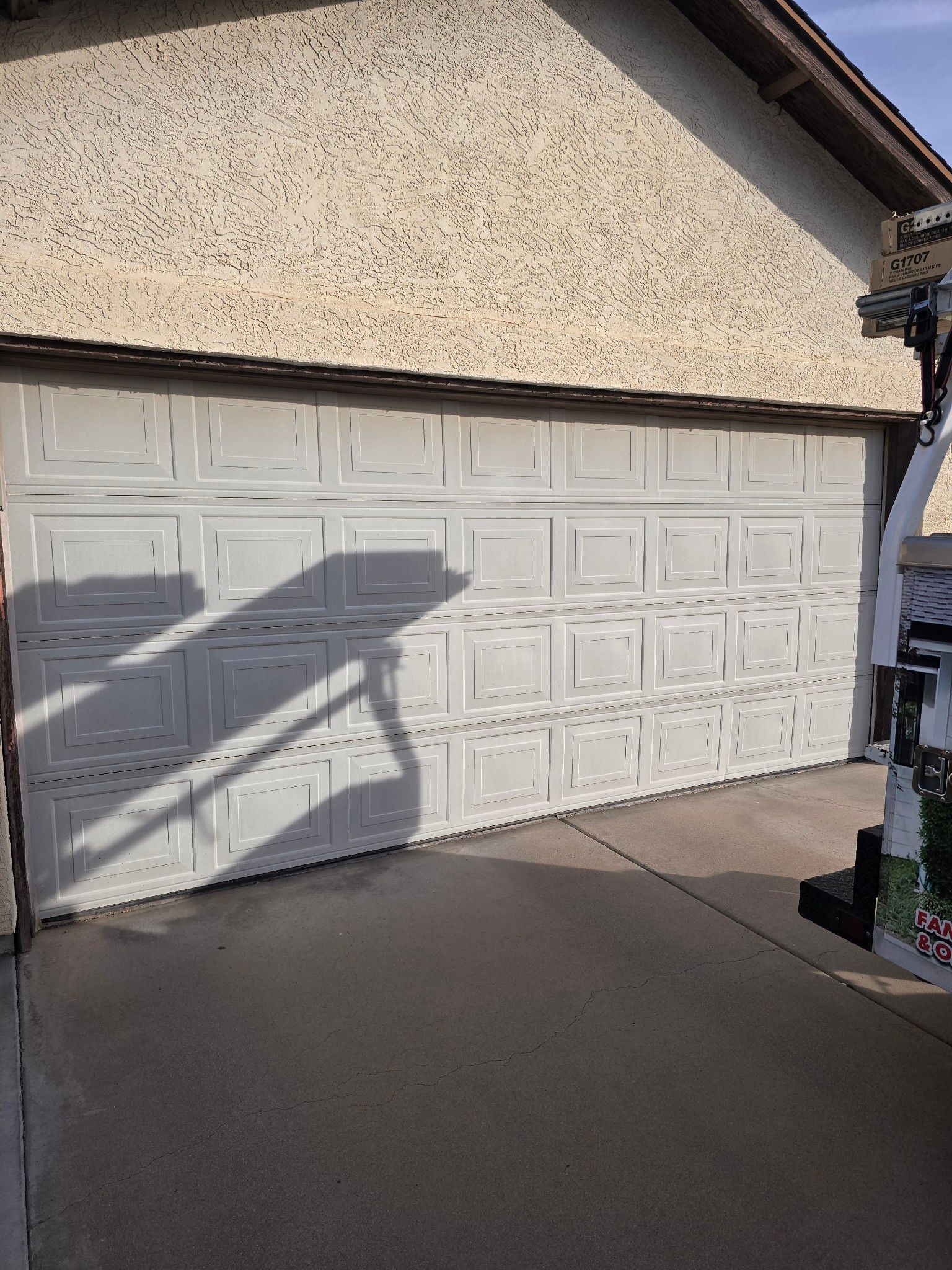 sun faded garage door before replacement