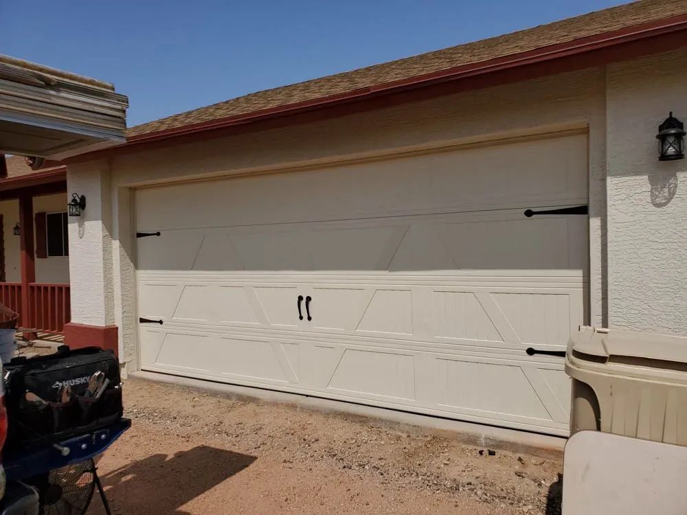 Stylish set of Avondale garage doors enhancing the curb appeal of a local home.