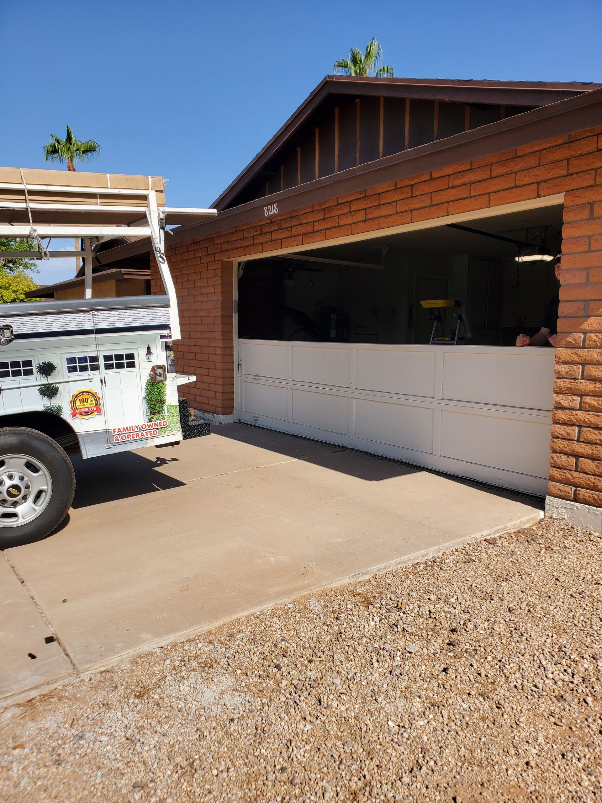 garage door panels being install on new garage door.