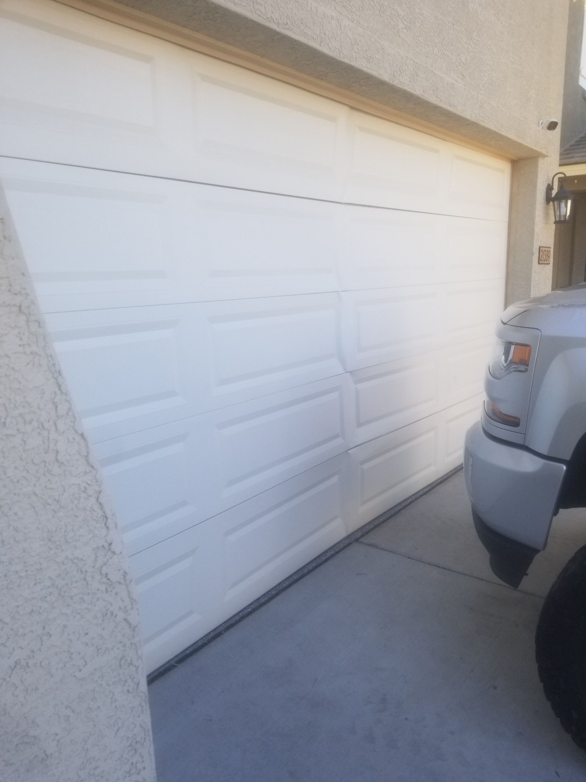 brand new garage door before being painted