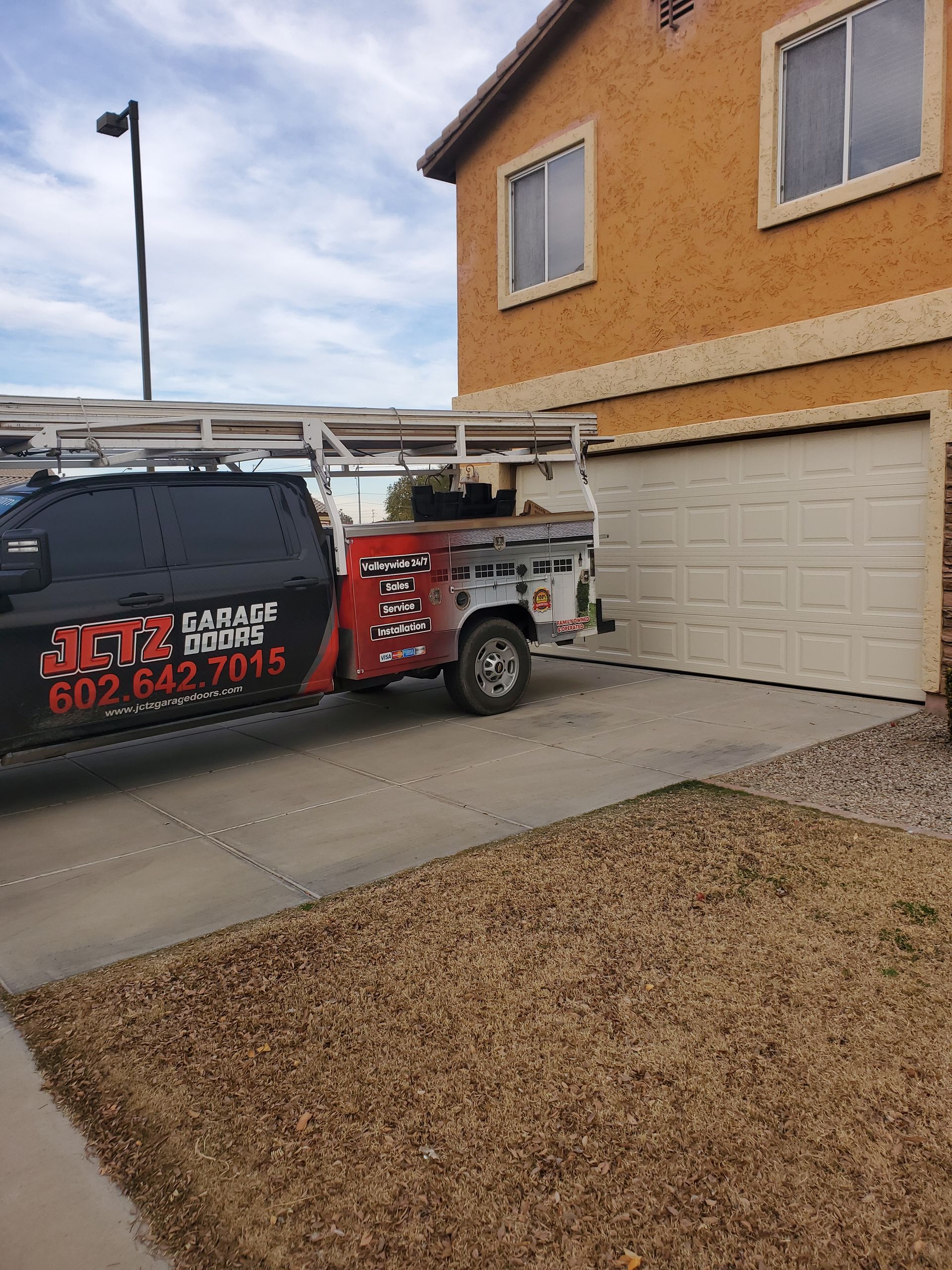 garage door technician ready to work on garage