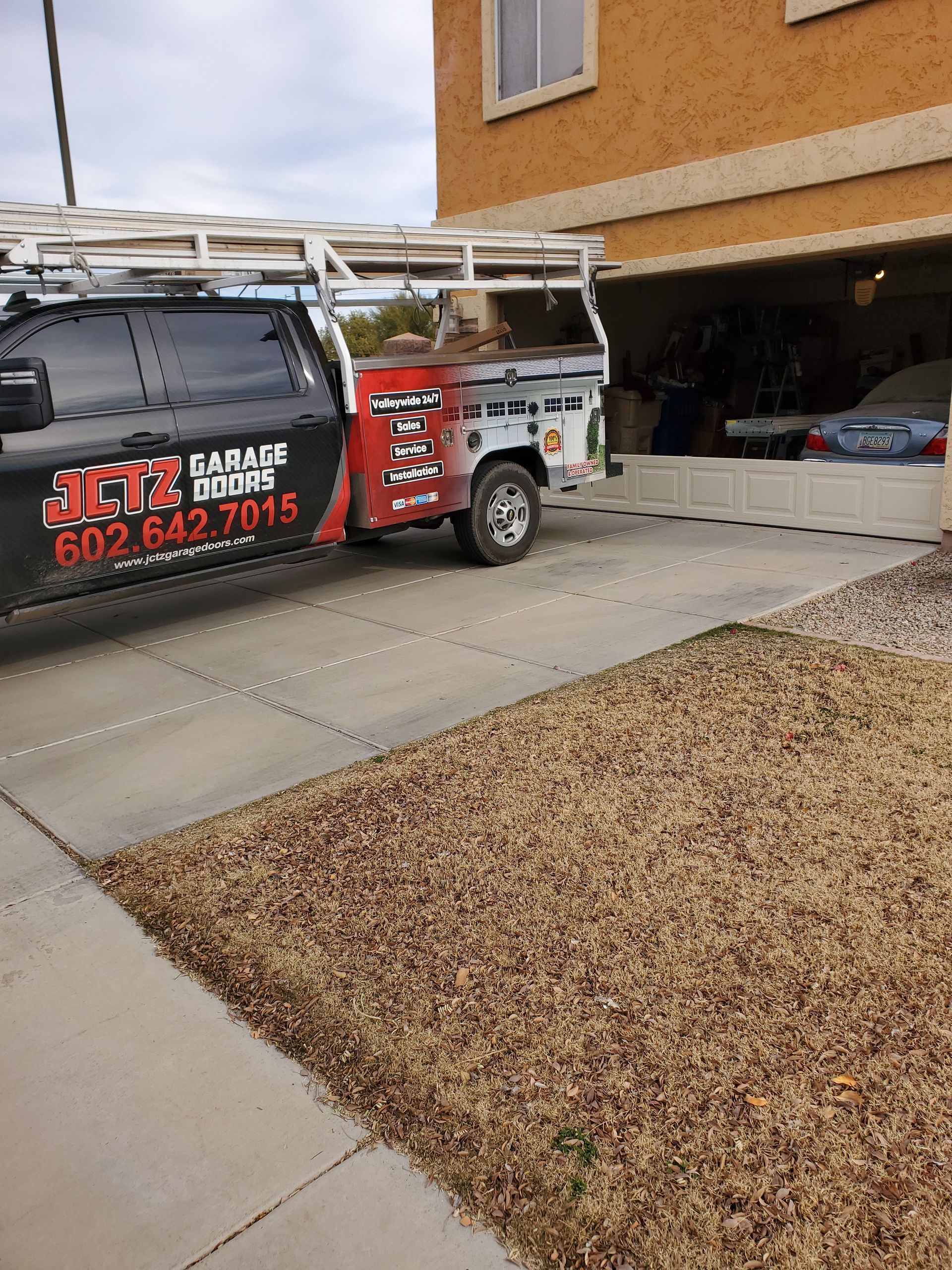garage door repair in progress