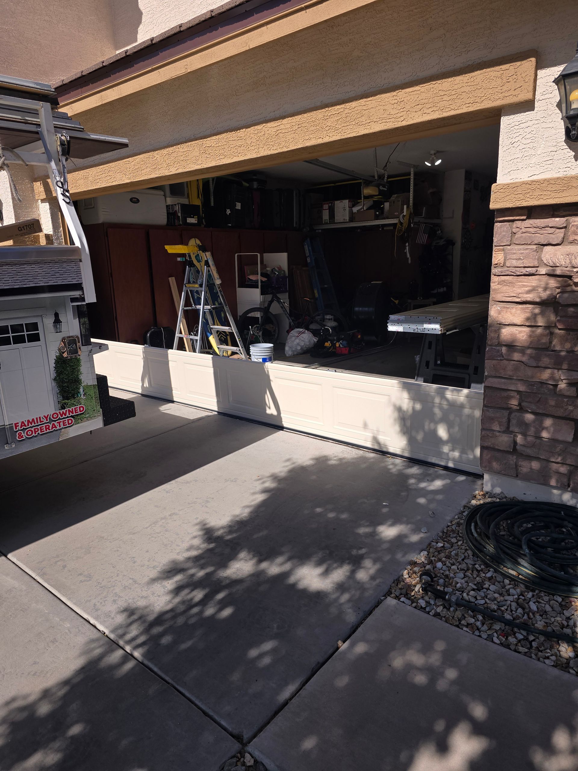 garage door being replaced by tech