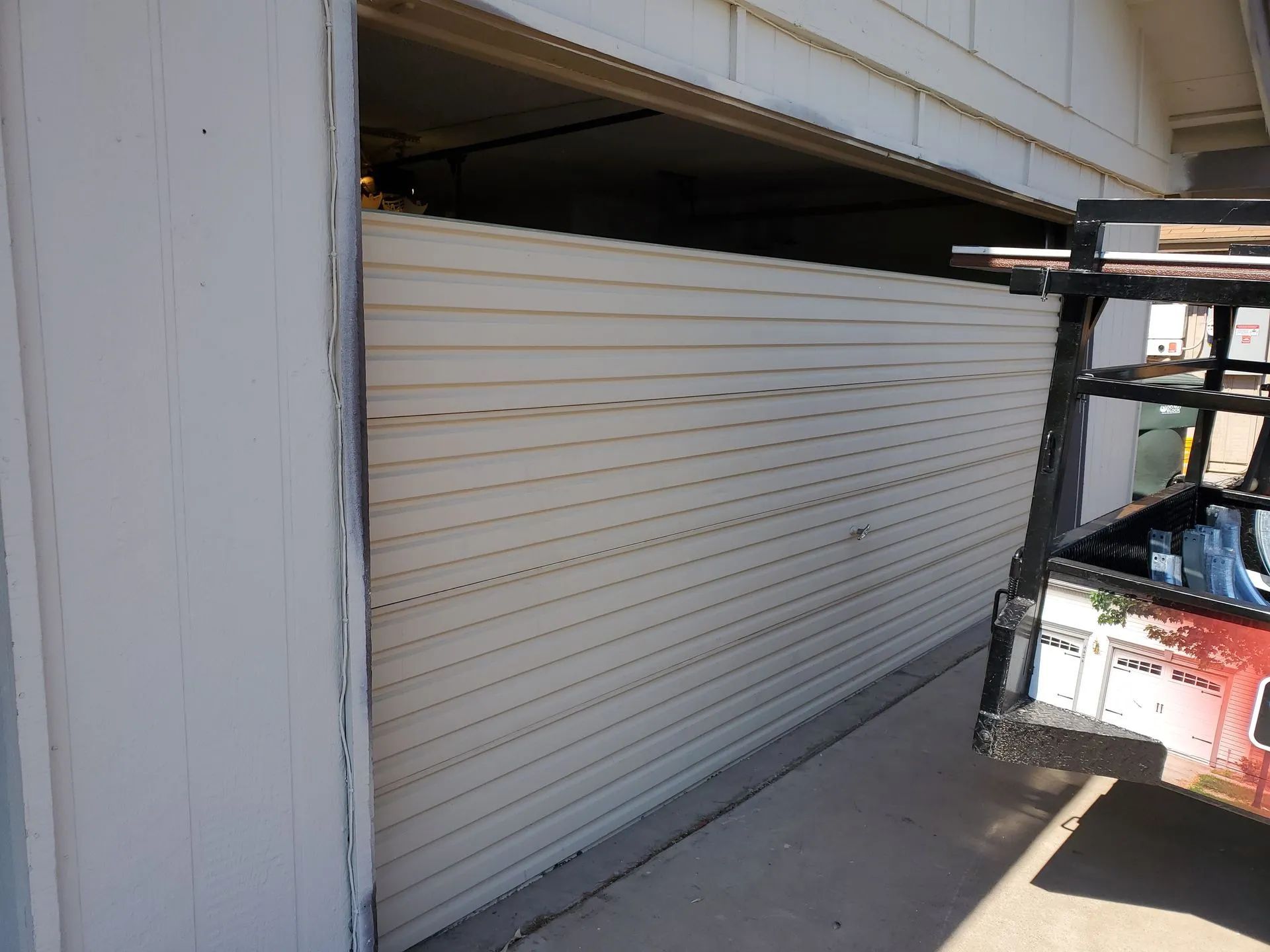 very old garage door being replaced