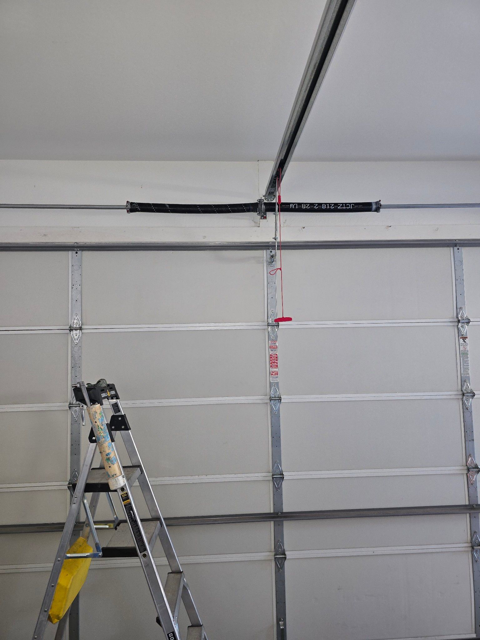 popped-garage-door-spring-replaced