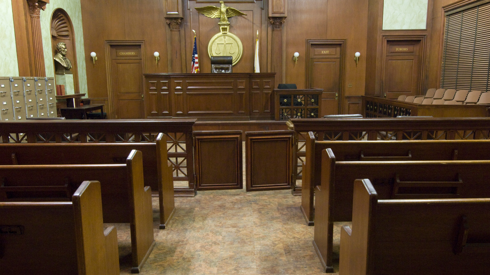 a statue of a woman holding a pair of scales of justice .