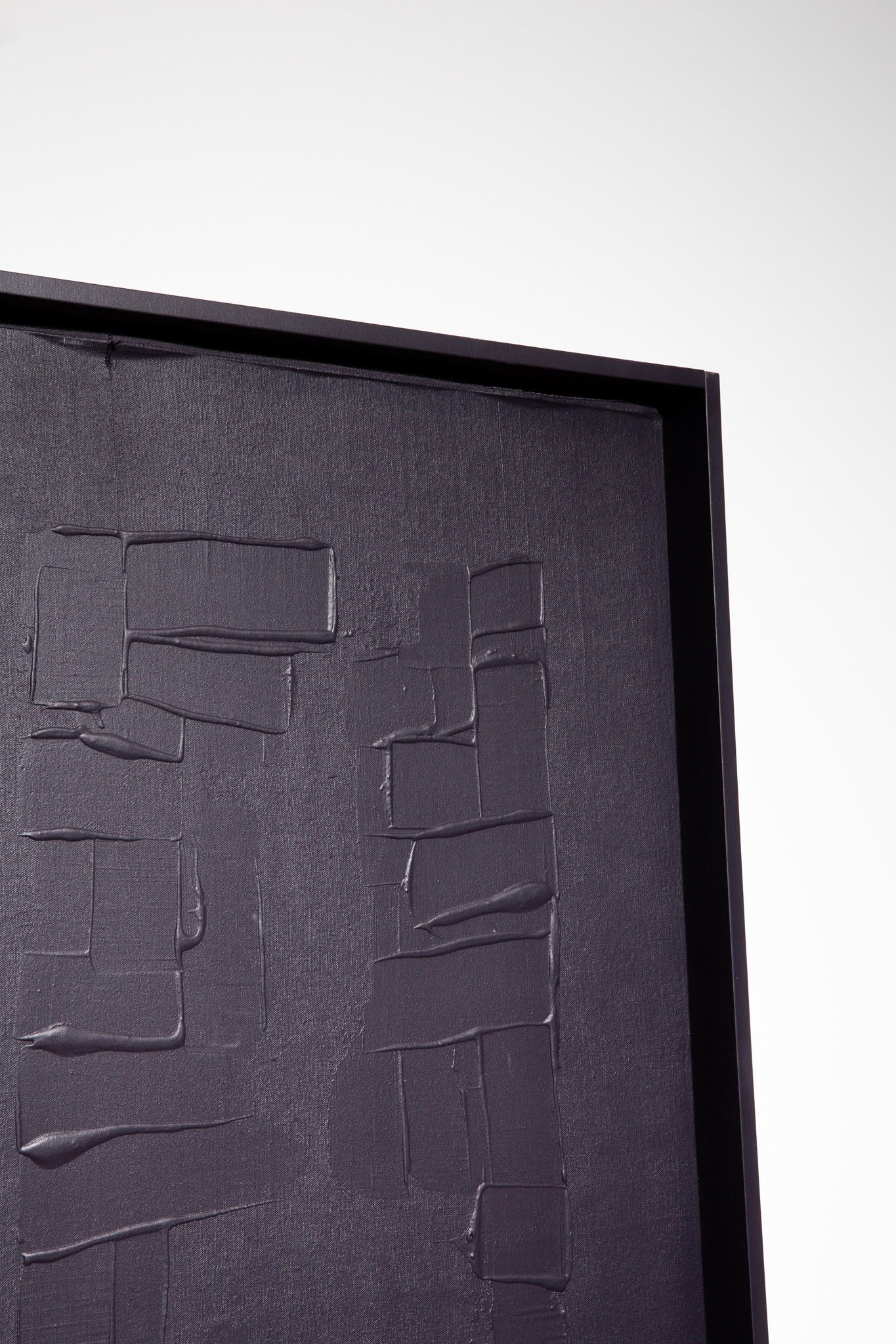 Dark textured artwork in a black frame, partially visible against a white background; art by Matt Remsbecher. 