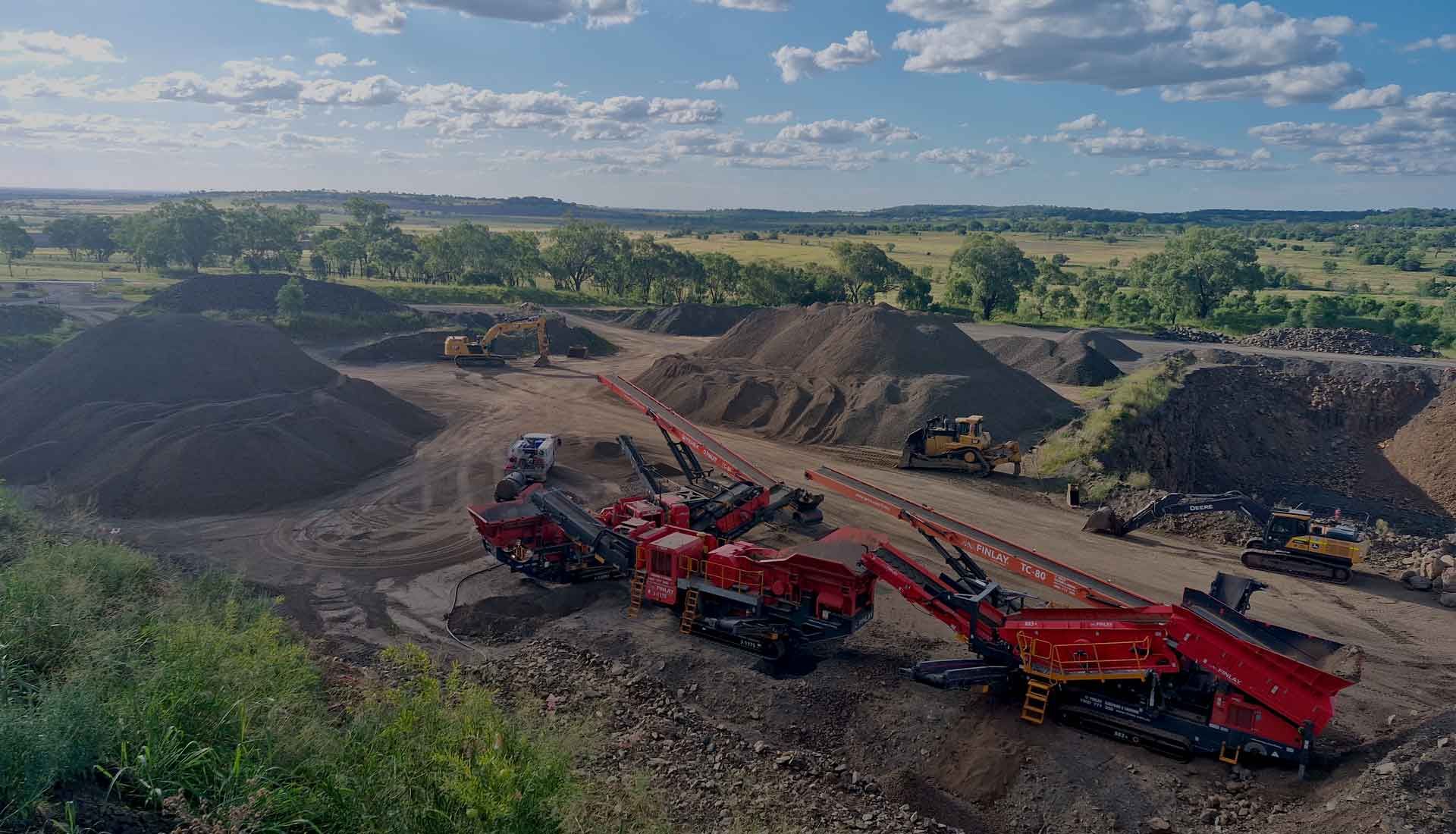 An aerial view of a construction site with a lot of machinery.