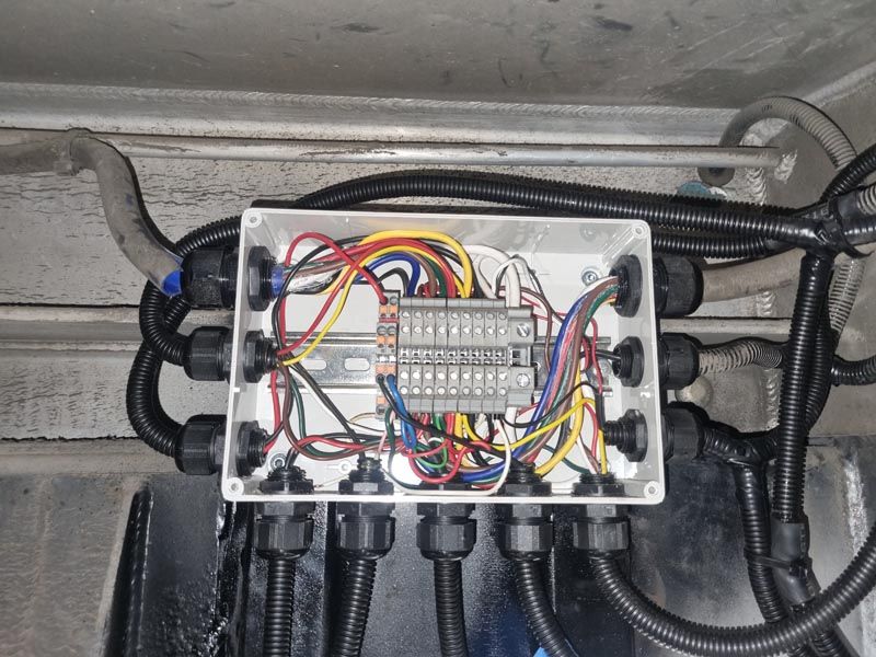 A box with a bunch of wires inside of it