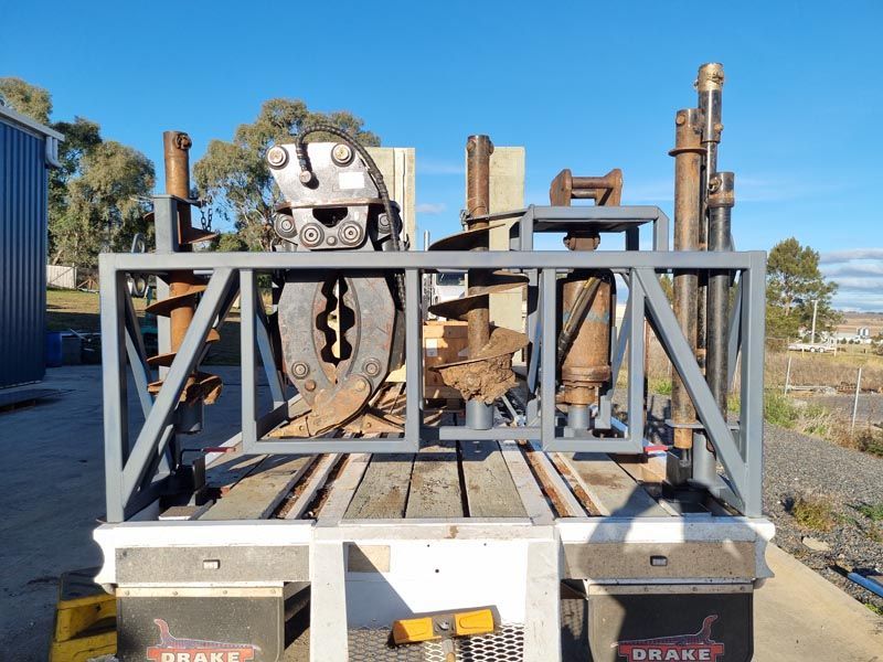 The back of a truck with a brake sign on it