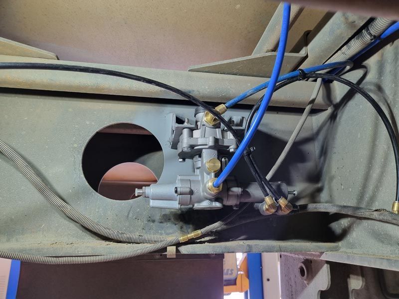 A bunch of wires are connected to a metal object