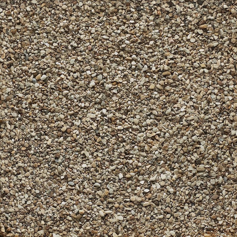 Small, light brown gravel covering a surface.