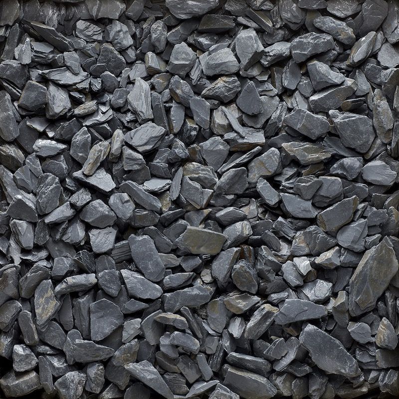 Dark gray slate gravel, close-up view.