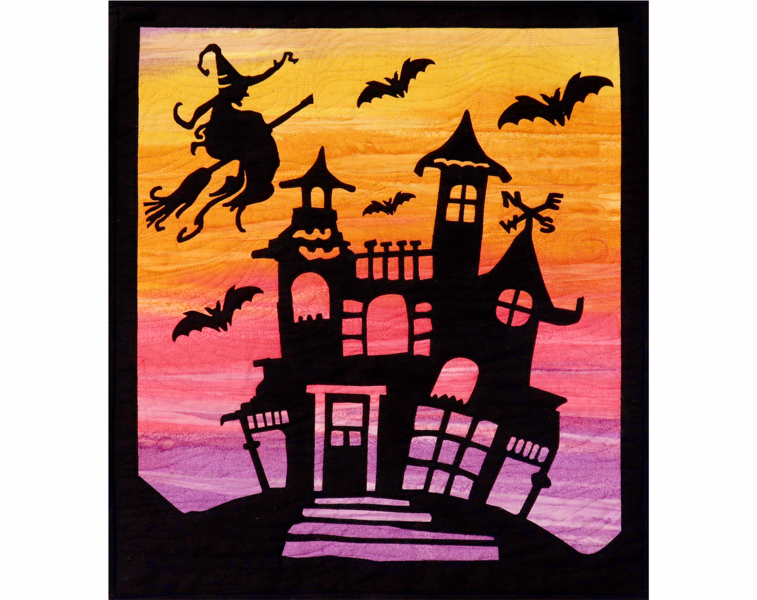 A haunted house with bats and a witch on a broom