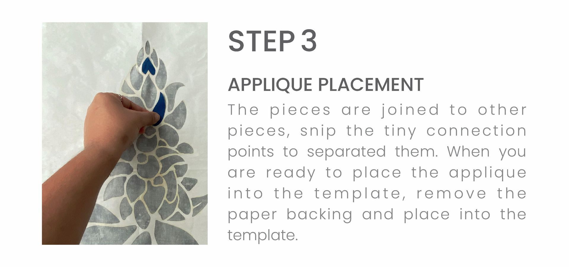 A person is applying a stencil to a wall.