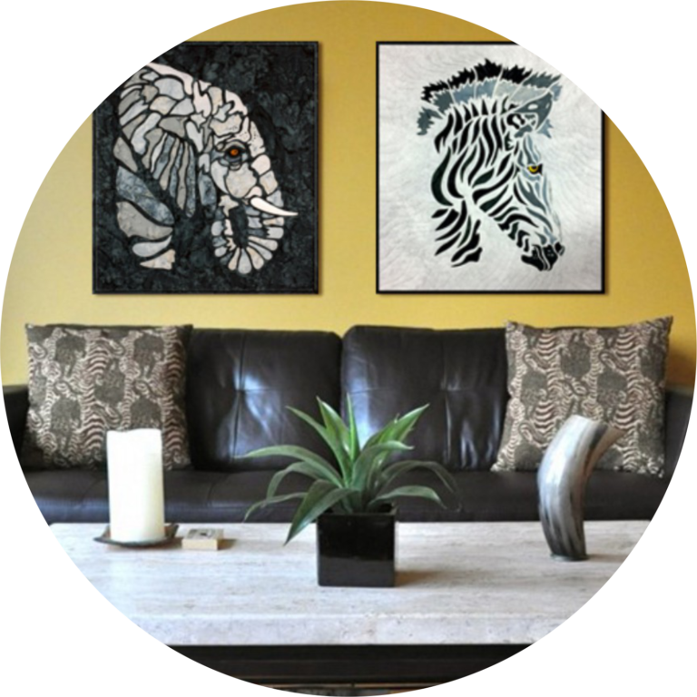 A living room with an elephant and zebra paintings on the wall