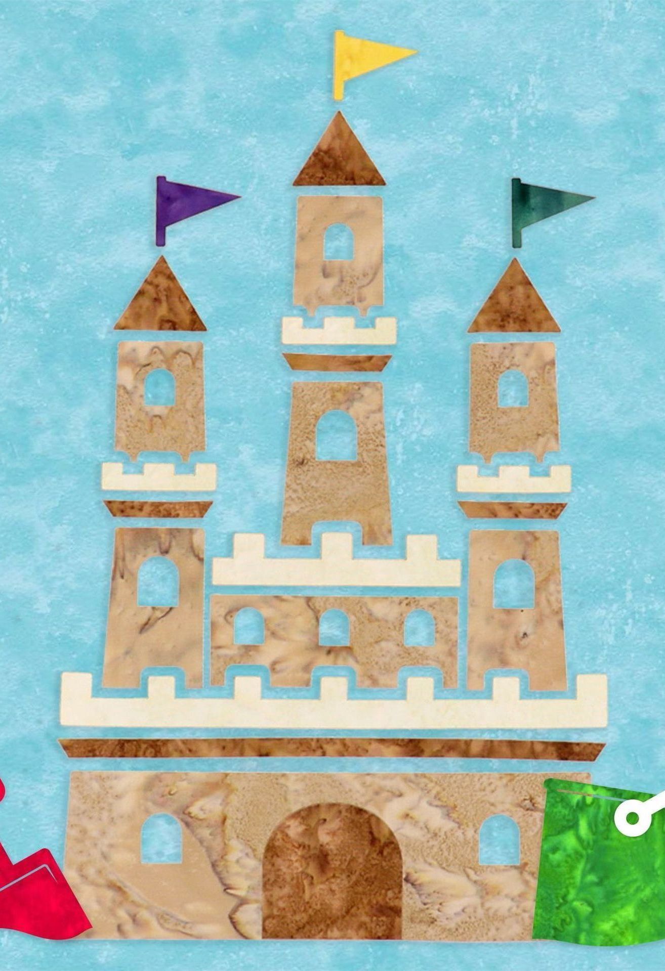 A sand castle with flags on top of it on a blue background