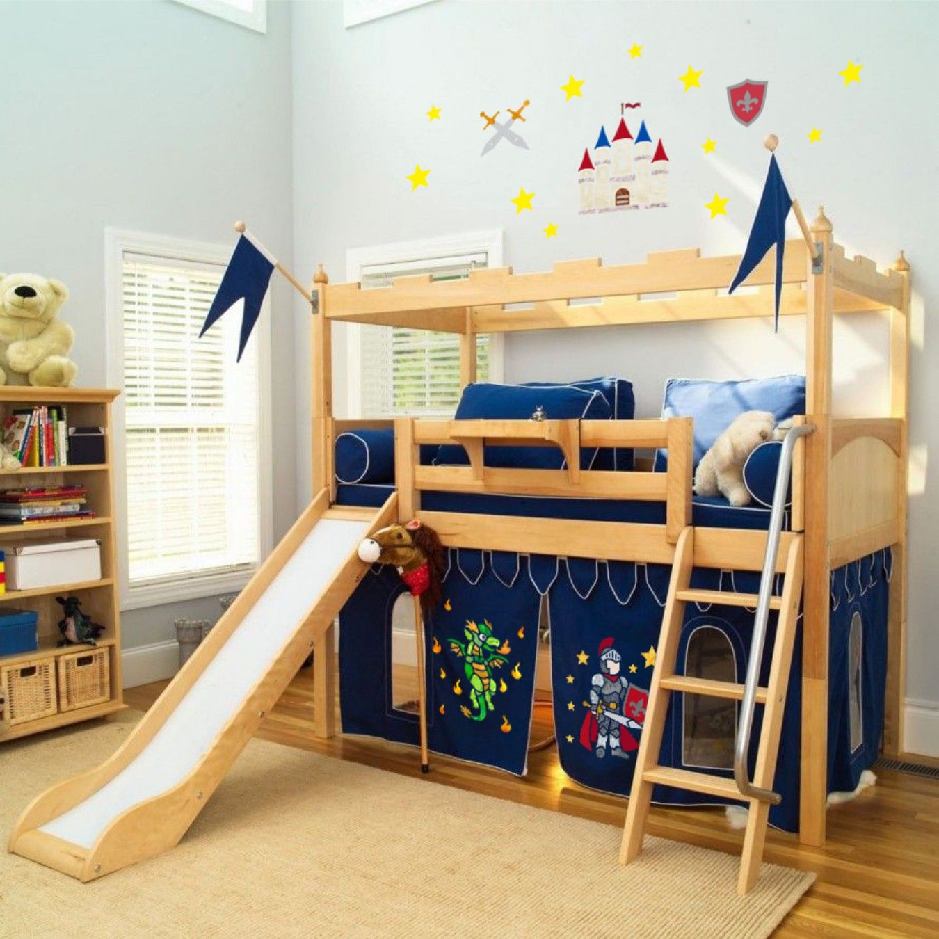 A bunk bed with a slide and stairs in a room