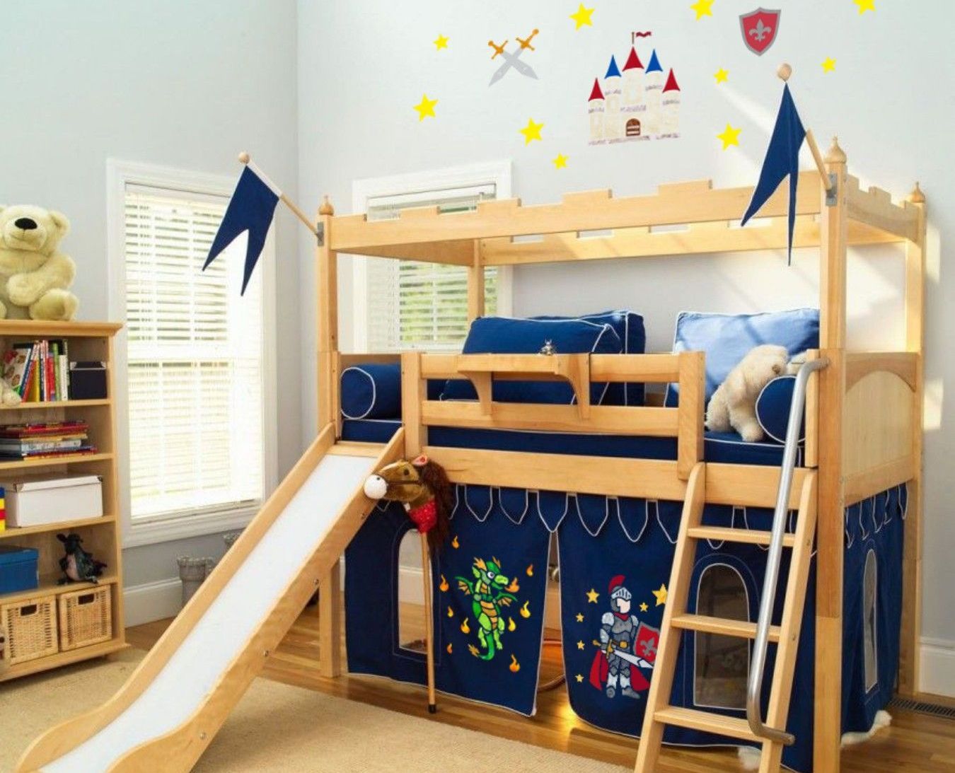 A bunk bed with a slide and ladder in a room