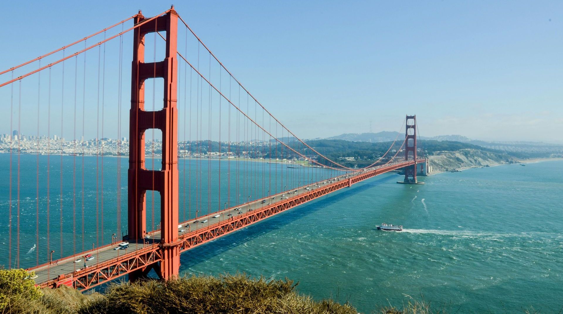 The golden gate bridge is a suspension bridge over a body of water.