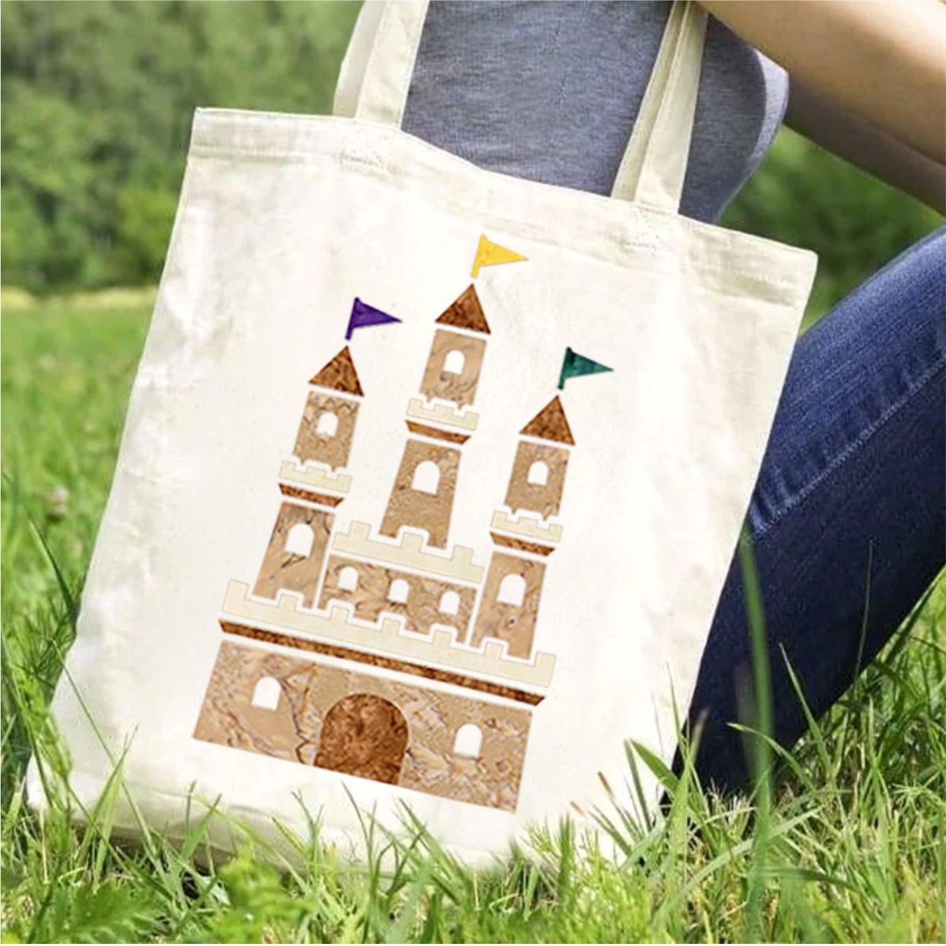 A tote bag with a picture of a castle on it