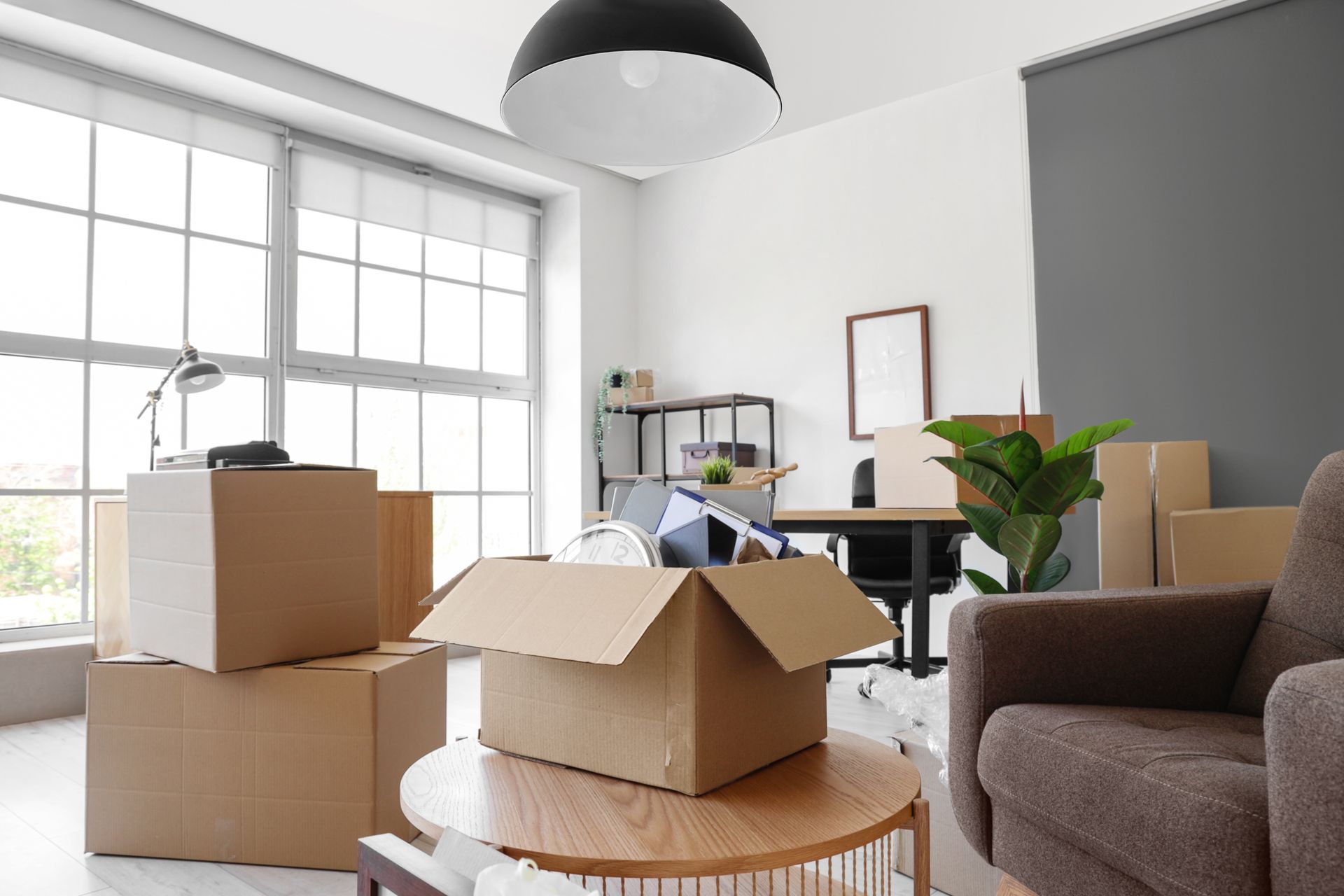 Boxes and furniture in a room