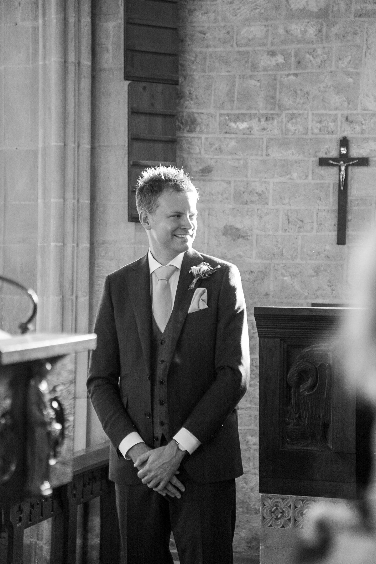 grooms first look at bride in church