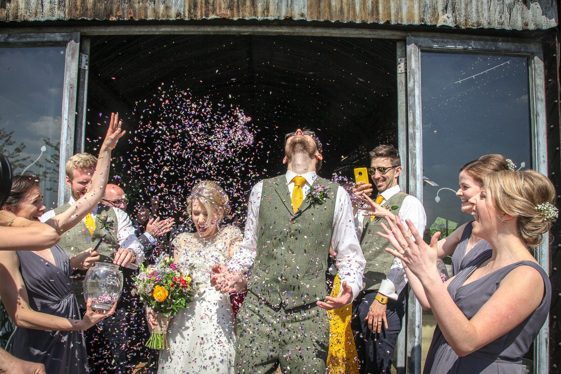 confetti at stone barn wedding
