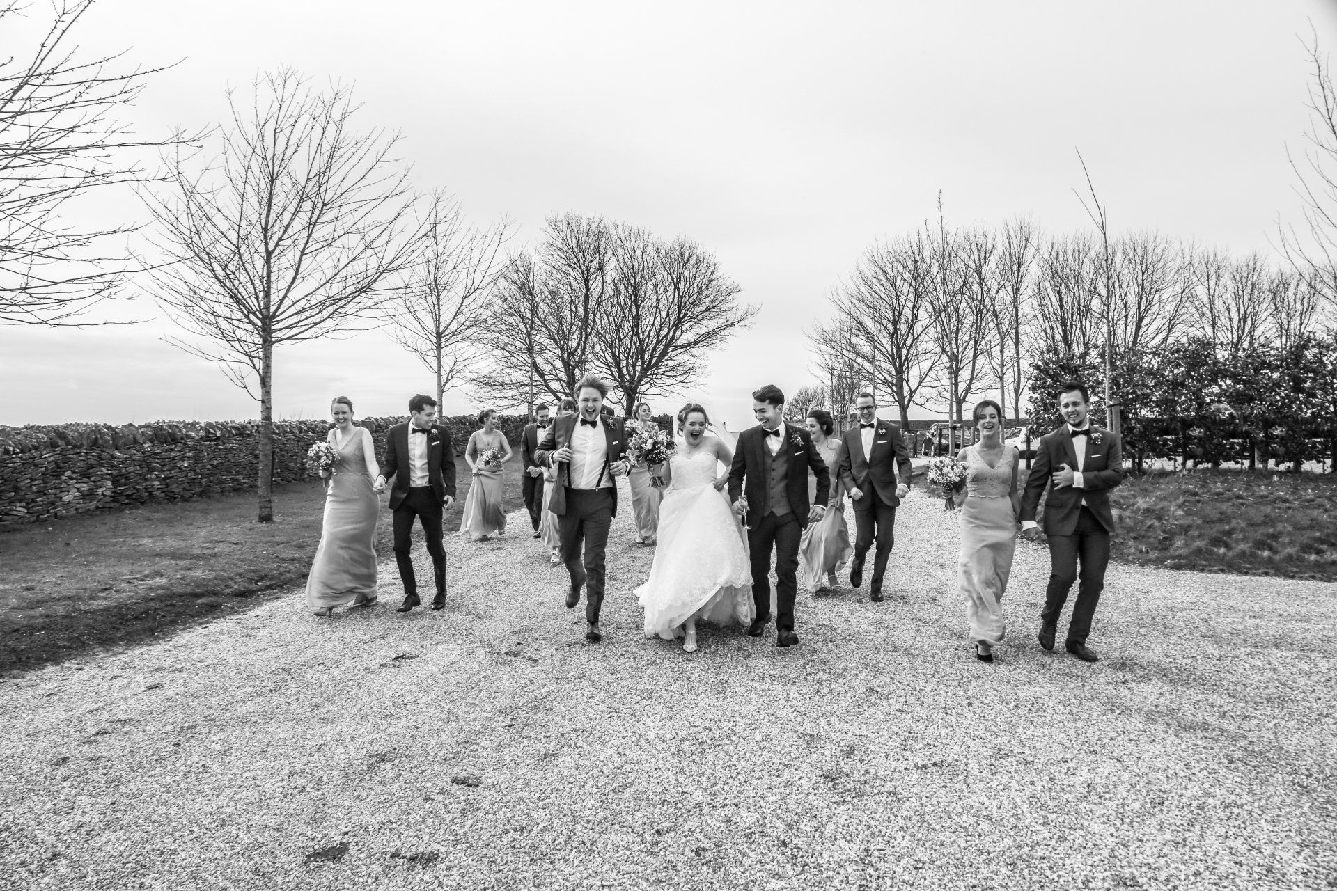 bridal party at stone barn wedding