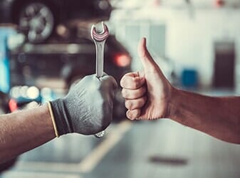 Mechanic And The Customer Having a Hand Sign — Vehicle repair In Long Beach, CA