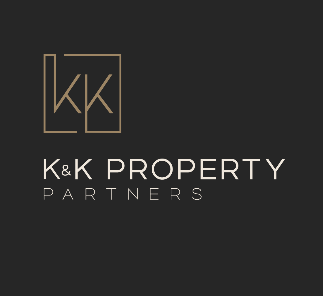 The K&K Property Partners logo features a tan-colored monogram of two K's inside a square on a dark gray background.