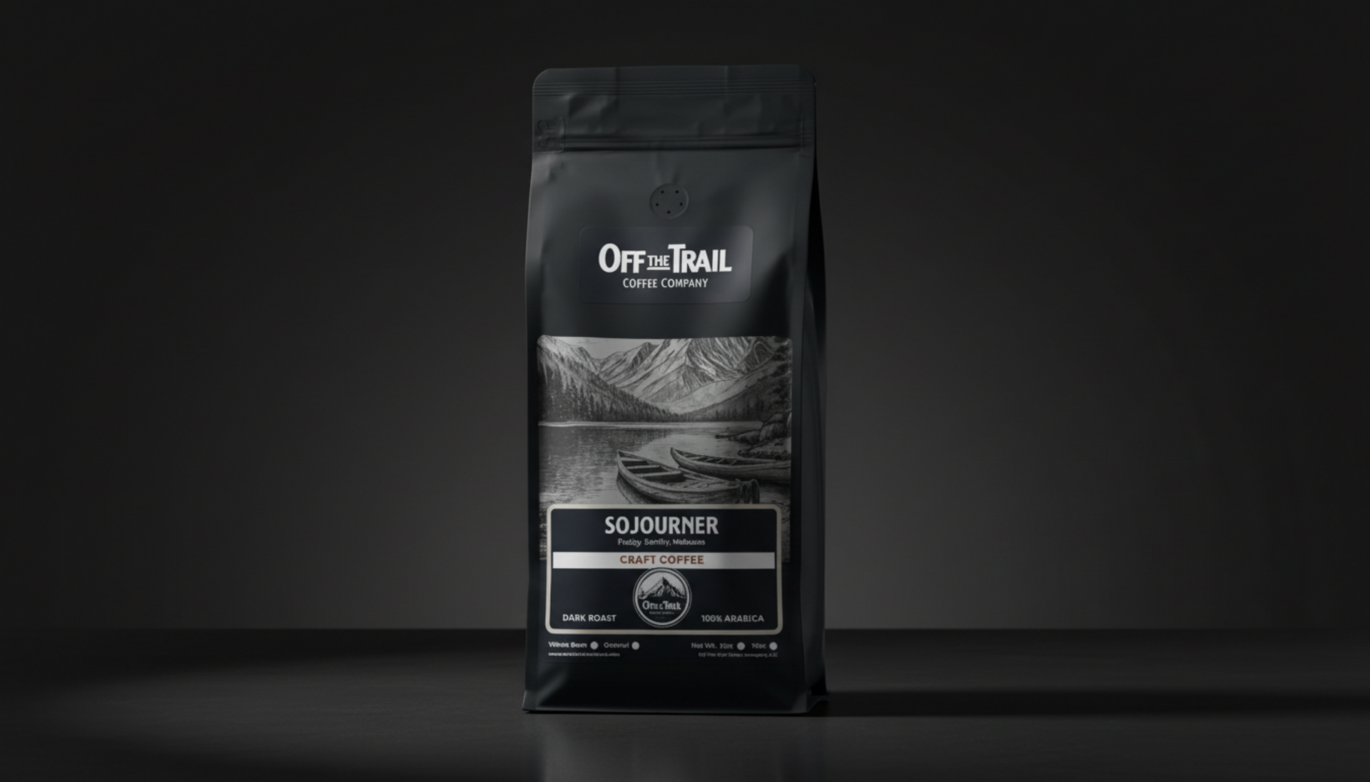 A black bag of Off the Trail brand coffee featuring a mountain landscape graphic on a dark background.