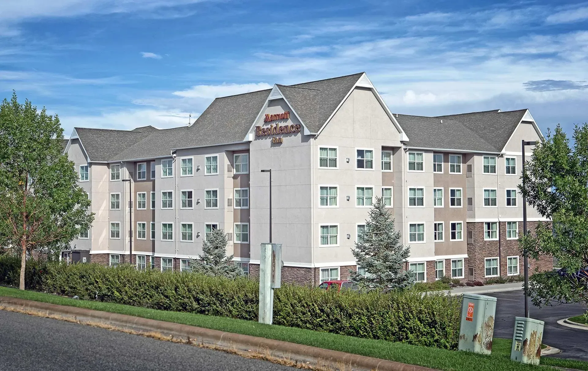 A large apartment building with a lot of windows