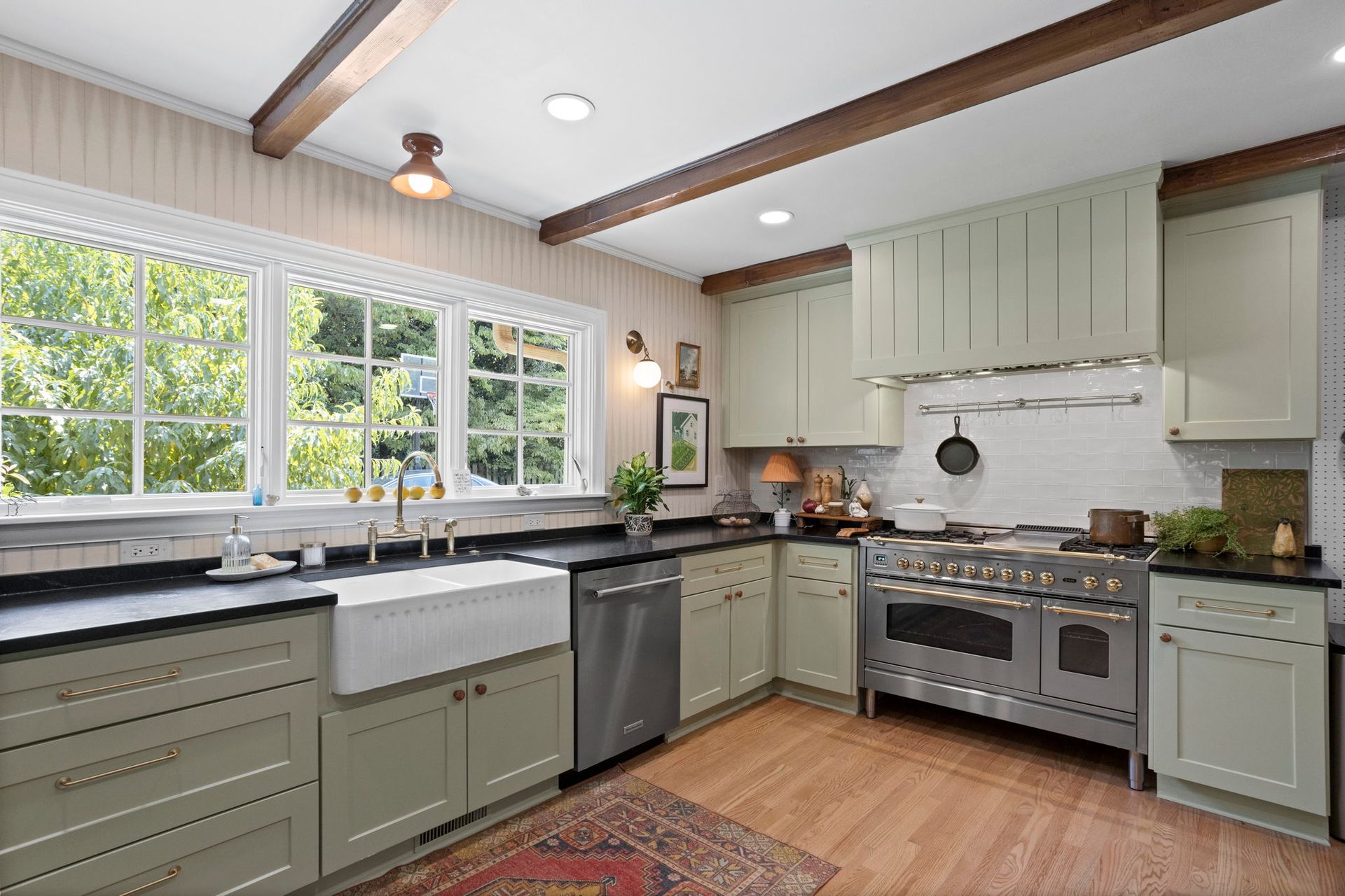 Green kitchen remodeled by Nunley Custom Homes in Greenville, SC.